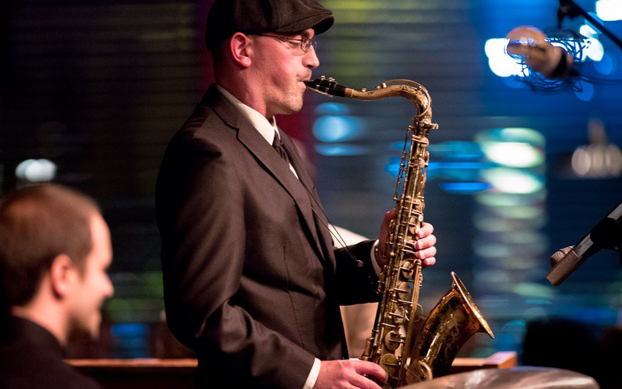 Kareem Kandi by Daniel Sheehan Kareem Kandi playing saxophone