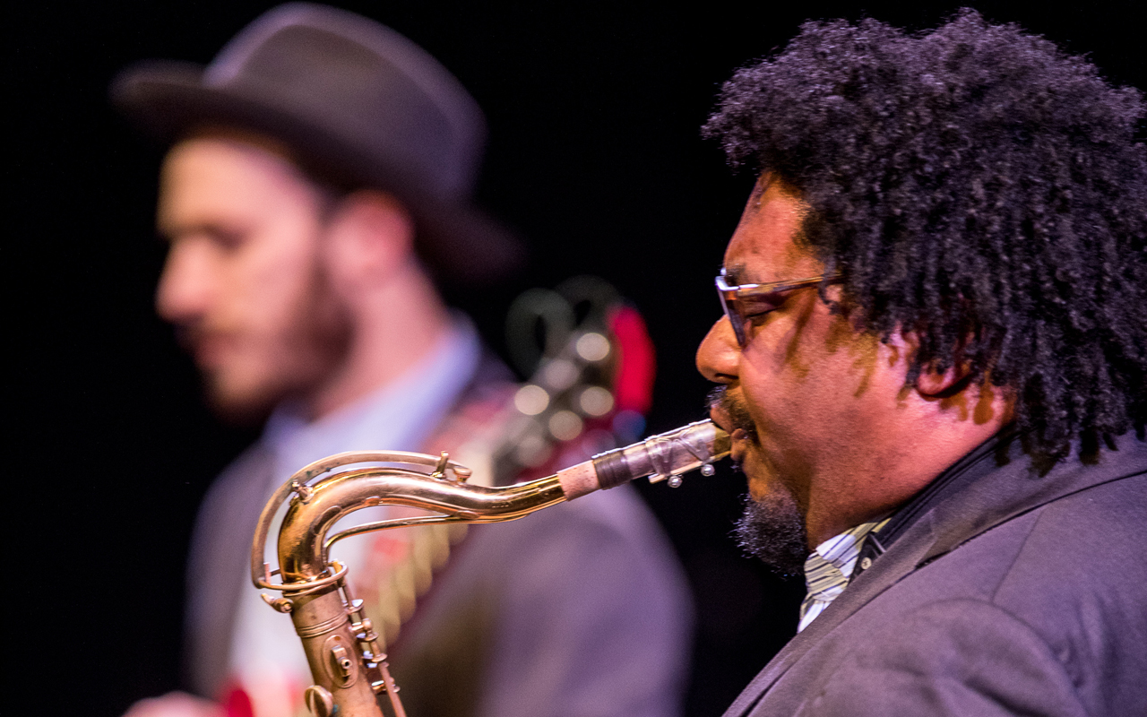 Alex Dugdale playing saxophone, photo by Daniel Sheehan.