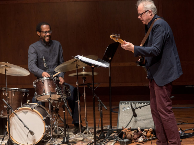 Brian Blade playing drums and Bill Frisell playing guitar, photo by Daniel Sheehan.