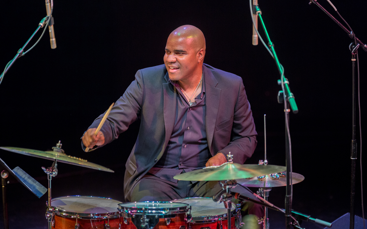 D'Vonne Lewis Playing drums, photo by Daniel Sheehan.