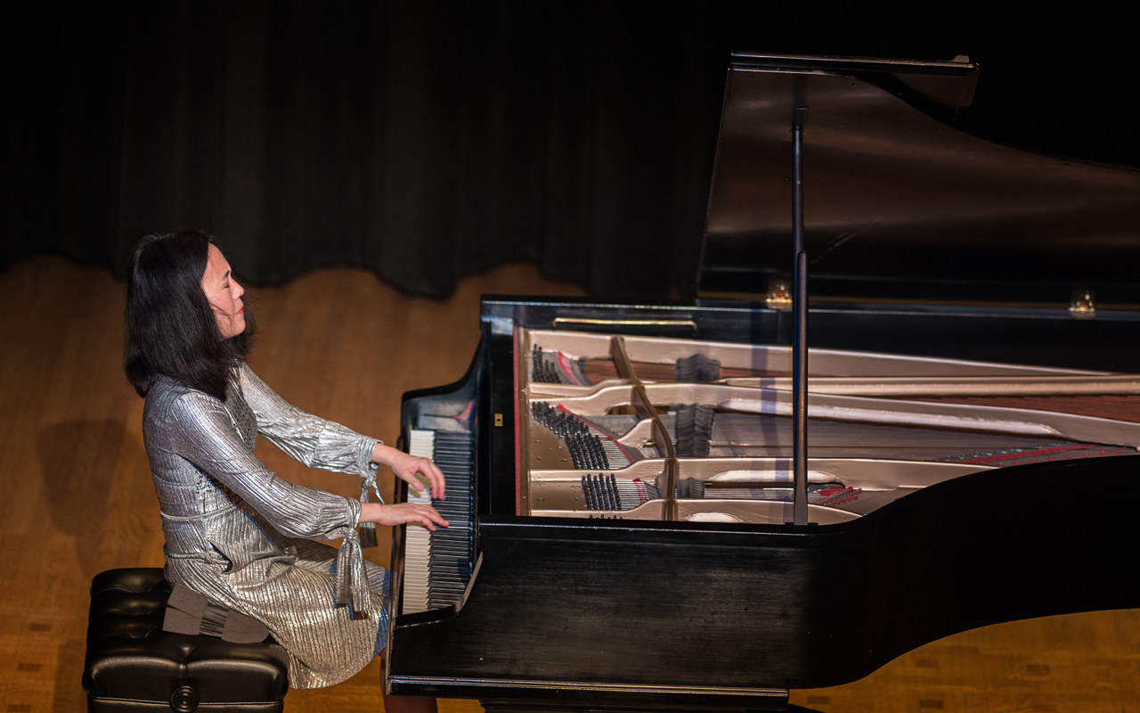 Helen Sung playing piano, photo by Daniel Sheehan.