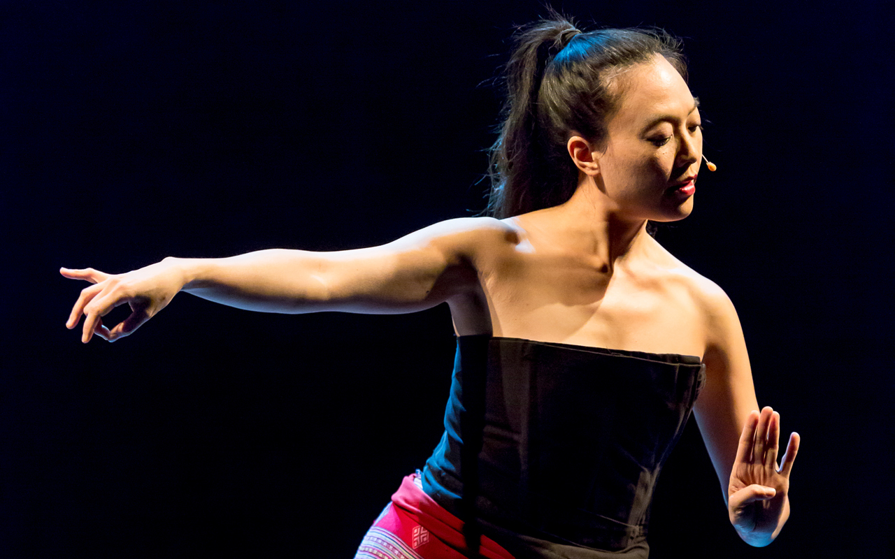 Jen Shyu dancing, photo by Daniel Sheehan.