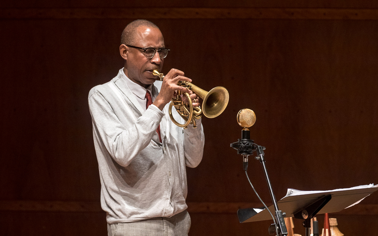Ron Miles playing the horn, photo by Daniel Sheehan.