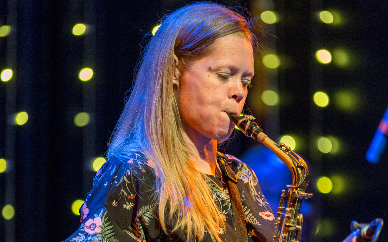 Caroline Davis playing saxophone, photo by Daniel Sheehan.