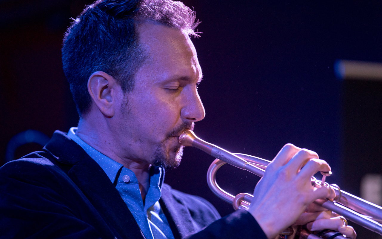 Chad McCullough playing trumpet, photo by Daniel Sheehan.