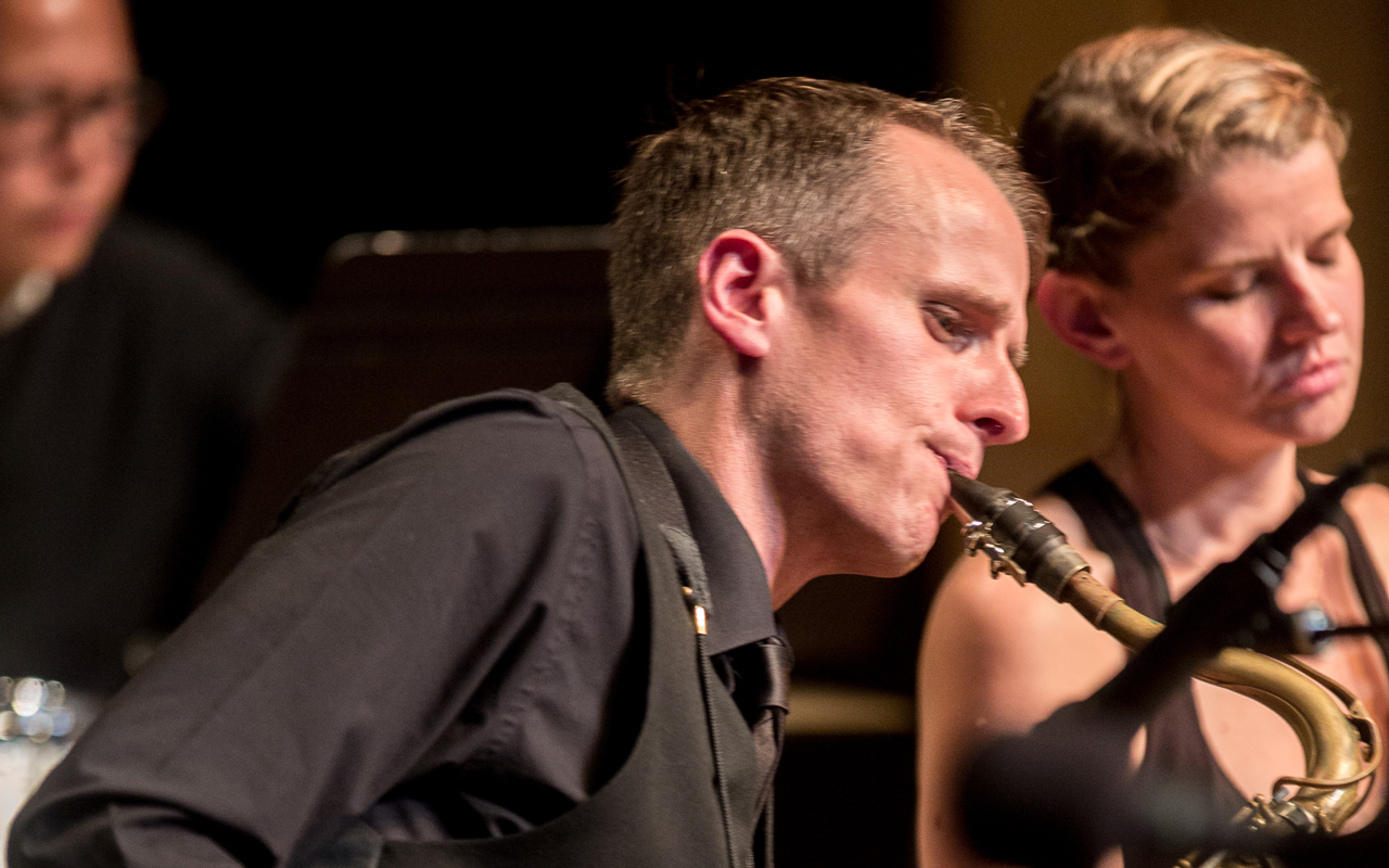 Neil Welch playing saxophone, photo by Daniel Sheehan