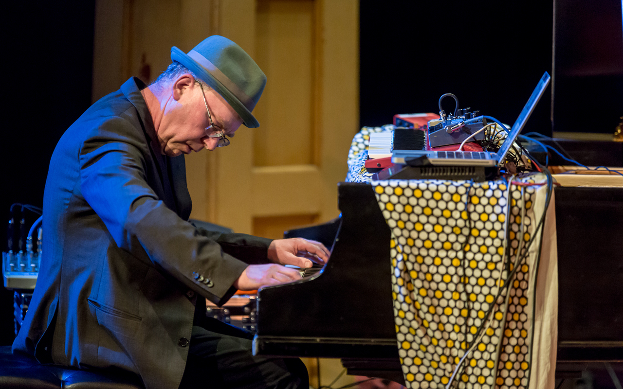 Wayne Horvitz playing piano, photo by Daniel Sheehan.