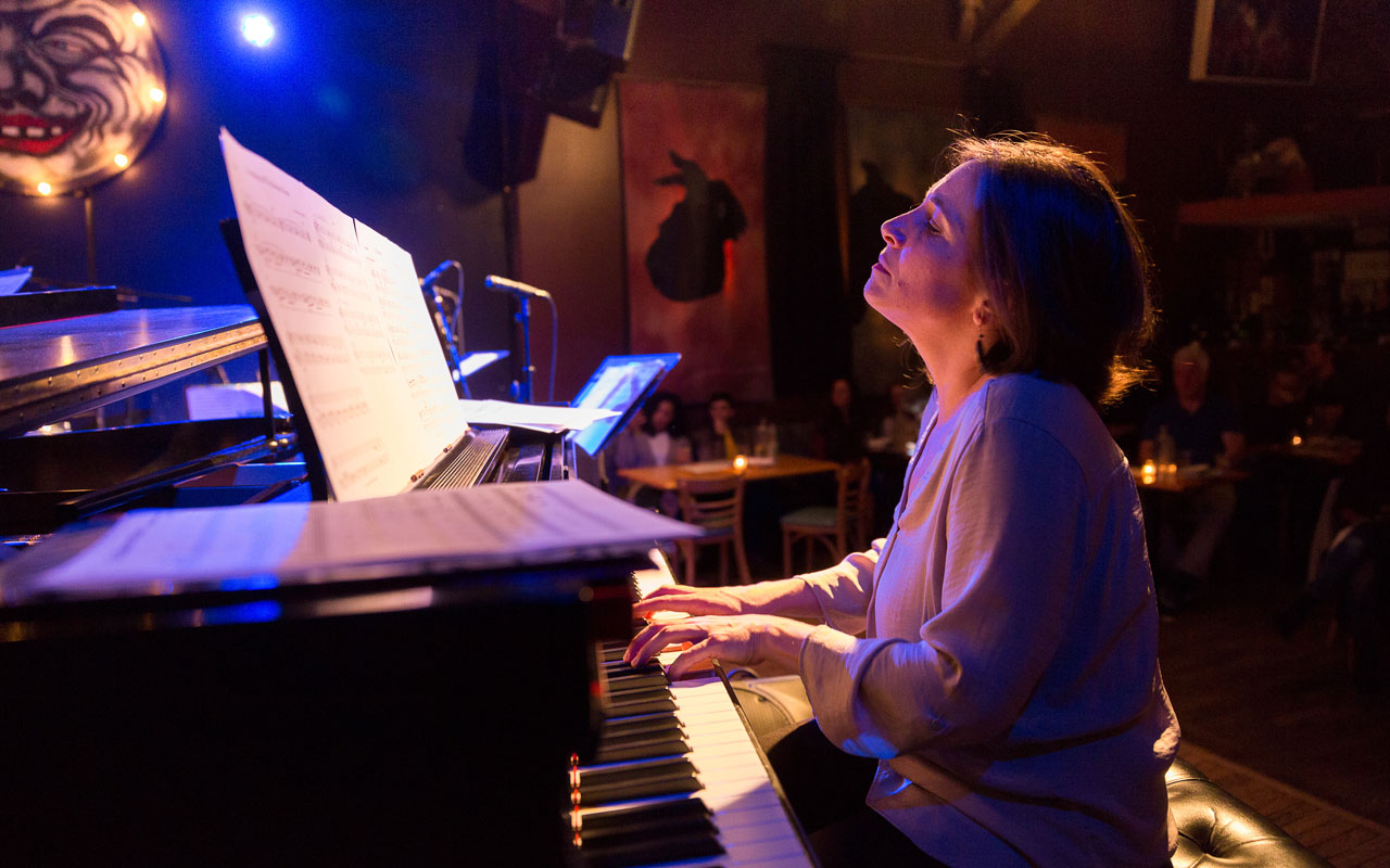 Marina Albero by Daniel Sheehan Marina Albero sitting playing the piano at the Royal Room