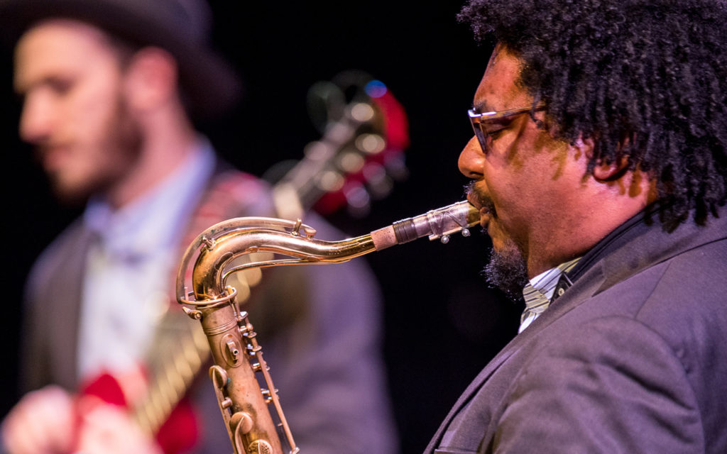 Alex Dugdale playing saxophone