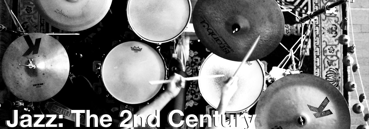 x_2ndcenturyslider Close up of a musician playing a guitar with the words Jazz the second century, call for artists, superimposed over the image.