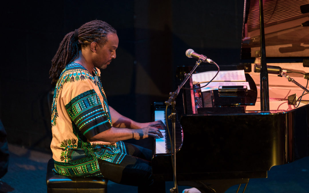 Darrius Willrich playing piano at the Langston Hughes Performing Arts Institute