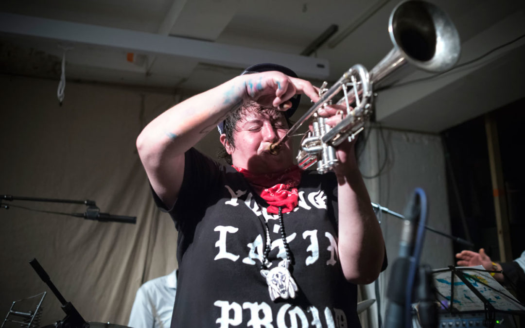 Jaimie Branch playing a trumpet