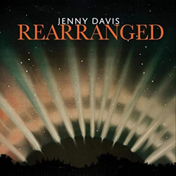 Album cover for Rearranged  by Jenny Davis featuring rays of light emanating from the earth.