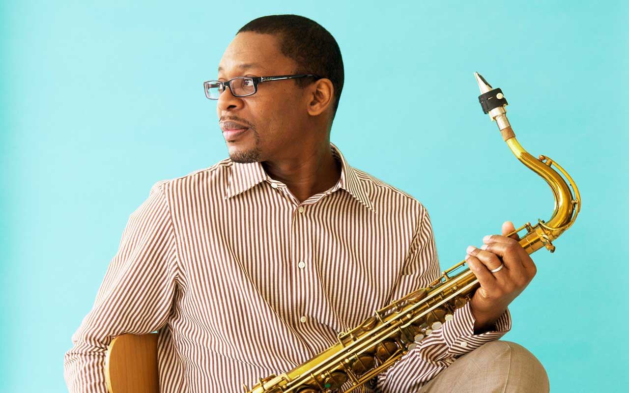 Ravi Coltrane by Deborah Feingold Ravi Coltrane holding a saxphone