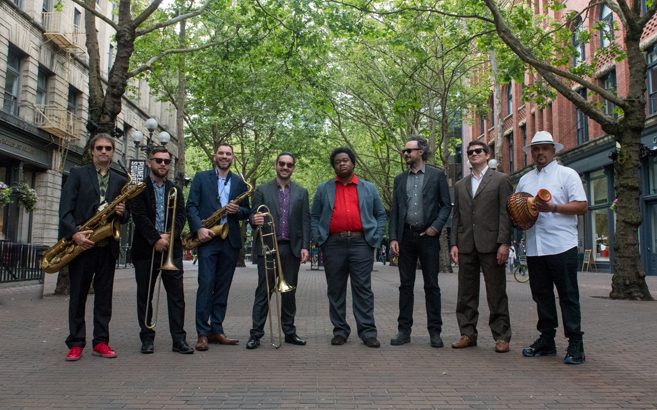 X_True-Loves_NO2_by-Morgen-Schuler-(1)-(1) True Love, octet members standing in a line in Pioneer Square Seattle.