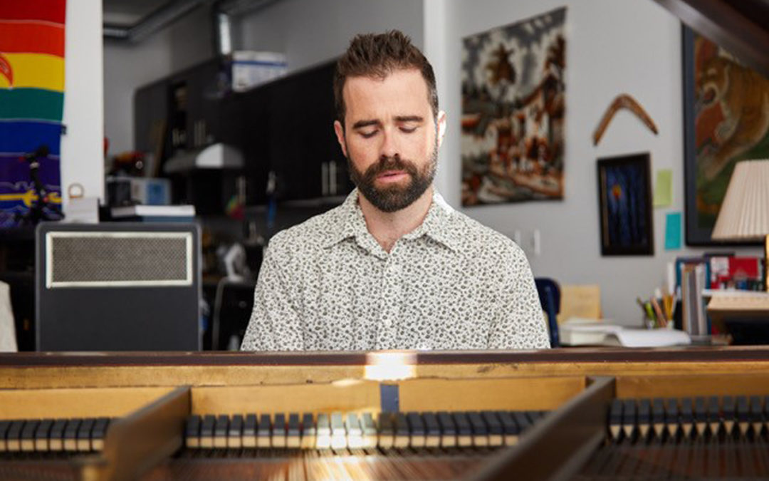 Alex Chadsey playing the piano.